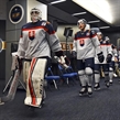BUFFALO, NEW YORK - DECEMBER 27: Slovakia's David Hrenak #1 and Adam Ruzicka #21 lead their team to the ice for warm-up prior to preliminary round action against Canada at the 2018 IIHF World Junior Championship. (Photo by Matt Zambonin/HHOF-IIHF Images)

